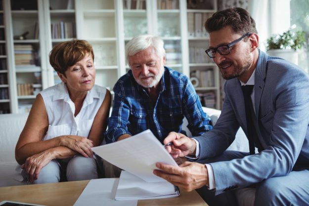 Family discussing with the law agent
