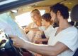Family looking at the map in the car