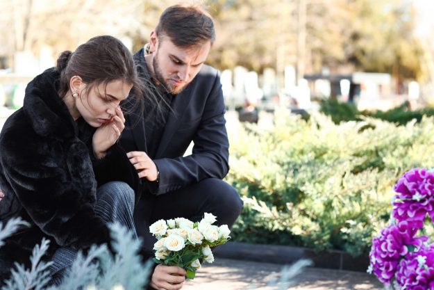 Couple mourning their relative that died through wrongful death