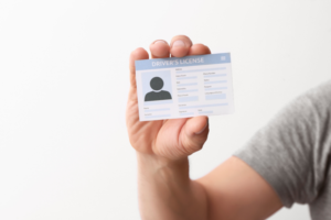 Person showing ID.